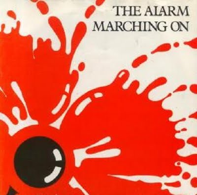 the alarm В октябре 1982 года на IRSRecords выходит сингл The Alarm - "Marching On".